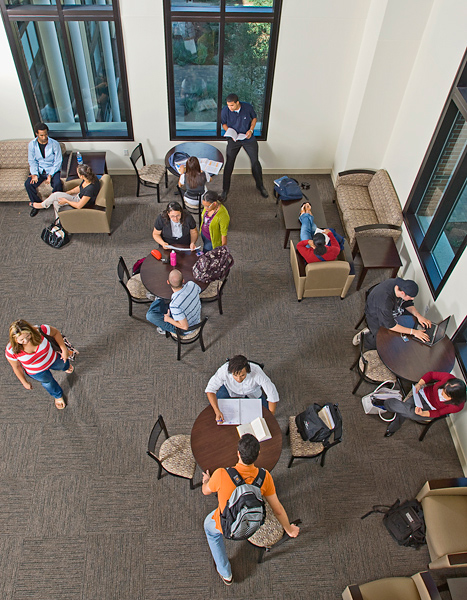 Overhead shot of students studying, conversing in the lobby outside the EOP office (SSC 310).