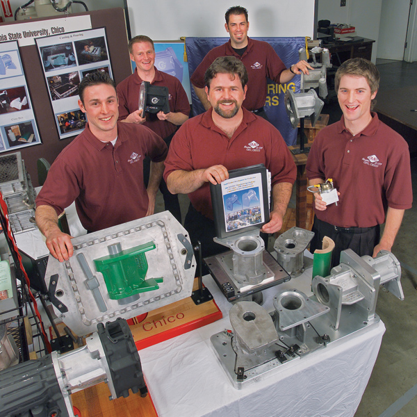 Five Chico State representatives stand near and hold varying engineering models and displays.