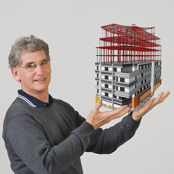 Man (left) with arms extended "holds" 3D rendering of structure at various stages of completion.